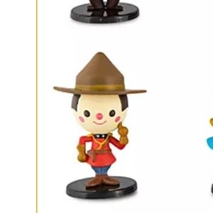 It's a Small World Vinyl Collectible Figurine